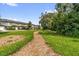 Walking path between neighborhood homes, perfect for morning jogs or evening strolls at 3206 Water Sprite St, Orlando, FL 32808