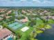 Aerial view of the community showing lake access, recreation facilities, and lush landscaping at 3213 Kentshire Blvd, Ocoee, FL 34761