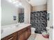 Bathroom featuring a shower/tub combo, spacious vanity, and neutral walls at 3213 Kentshire Blvd, Ocoee, FL 34761