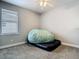 Bedroom featuring an air mattress with a comfy beanbag chair and a window at 3213 Kentshire Blvd, Ocoee, FL 34761