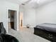 Bedroom with dark wood furniture and open closet at 3213 Kentshire Blvd, Ocoee, FL 34761