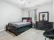 Bedroom with dark wood furniture, neutral walls, and carpet at 3213 Kentshire Blvd, Ocoee, FL 34761