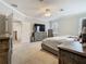 Large main bedroom with carpeting, large dresser, and ceiling fan at 3213 Kentshire Blvd, Ocoee, FL 34761