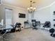 Bright home office with two desks, neutral walls, and ample natural light at 3213 Kentshire Blvd, Ocoee, FL 34761
