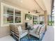 Inviting covered patio with comfortable seating, a ceiling fan, and a mounted TV for outdoor enjoyment at 3213 Kentshire Blvd, Ocoee, FL 34761