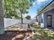 Spacious backyard featuring a wooden deck and a white privacy fence, providing an ideal outdoor space at 3259 Alling Ct, Deltona, FL 32725