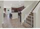 Open concept with island bar top, cherry cabinets, and stainless appliances at 3259 Alling Ct, Deltona, FL 32725