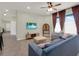 Inviting living room with tile floors and large windows for a bright, airy atmosphere at 3259 Alling Ct, Deltona, FL 32725