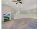 Spacious open loft offers versatile living space with a ceiling fan and recessed lighting at 3259 Alling Ct, Deltona, FL 32725