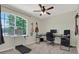 Bedroom with desk, chair, computer, treadmill, and fan at 3259 Alling Ct, Deltona, FL 32725