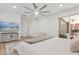 Spacious bedroom boasts a large television, private patio access, and comfortable seating, blending indoor and outdoor living at 356 Via Tuscany Loop, Lake Mary, FL 32746