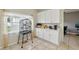 Kitchen area with cabinets, countertops, and tile flooring at 4208 Lugano Ct, Kissimmee, FL 34746