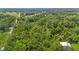 Aerial of lot surrounded by tall trees providing privacy at 4825 N Fort Christmas Rd, Christmas, FL 32709