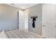 Neutral toned bedroom featuring a locker room sign on the wall at 5684 Gingham Dr, Kissimmee, FL 34758
