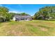 Expansive backyard featuring a screened-in pool and plenty of space for outdoor activities at 5913 Masters Blvd, Orlando, FL 32819