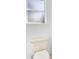 Bathroom with toilet, white walls, and neutral accents at 5913 Masters Blvd, Orlando, FL 32819