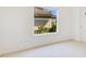 Bright bedroom features carpet floors and natural light from window at 5913 Masters Blvd, Orlando, FL 32819
