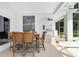 Covered patio with tile floors, seating area, grill, and ceiling fans at 5913 Masters Blvd, Orlando, FL 32819