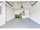 Clean and organized garage with ample space for parking and storage, ensuring functionality and convenience at 644 Villa Ct, Clermont, FL 34711
