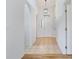 Bright hallway featuring tile flooring and arched entryways at 644 Villa Ct, Clermont, FL 34711