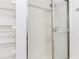 Shower with glass doors and shelving for storage at 644 Villa Ct, Clermont, FL 34711