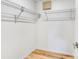 Walk-in closet with wood-look flooring and wire shelving for storage at 644 Villa Ct, Clermont, FL 34711