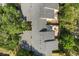 Overhead shot of the property highlights a private back patio with comfortable seating and a fire pit at 7466 Canford Ct # 25, Winter Park, FL 32792
