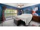 Bedroom with a balcony at 7466 Canford Ct # 25, Winter Park, FL 32792