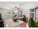 Cozy living room with comfortable seating and natural light at 7466 Canford Ct # 25, Winter Park, FL 32792