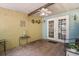 View of patio featuring ceiling fan and access to backyard at 7466 Canford Ct # 25, Winter Park, FL 32792