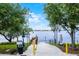 Community boat ramp with easy lake access is surrounded by mature landscaping and clear signage at 8057 John Hancock Dr, Winter Garden, FL 34787