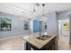 Bright kitchen with island, granite countertops, stainless steel appliances, and pendant lighting at 8057 John Hancock Dr, Winter Garden, FL 34787
