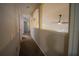 Hallway with carpet floors and view overlooking below at 8100 Fan Palm Way, Kissimmee, FL 34747