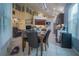 Open-concept living space with kitchen, dining area, living room, and second-floor overlook at 8100 Fan Palm Way, Kissimmee, FL 34747