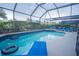 Enclosed pool area with comfortable lounge chairs offers a relaxing escape at 8100 Fan Palm Way, Kissimmee, FL 34747
