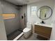 Modern bathroom featuring a sleek shower with stylish fixtures and a contemporary vanity at 1011 W 16Th St, Sanford, FL 32771
