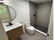 A contemporary bathroom is equipped with a sleek shower and a modern vanity at 1011 W 16Th St, Sanford, FL 32771