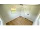 Bright bedroom featuring hardwood floors, natural lighting and white walls at 1011 W 16Th St, Sanford, FL 32771