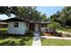 Charming single-story home with lush landscaping and a well-manicured lawn at 1011 W 16Th St, Sanford, FL 32771