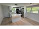 Modern kitchen featuring stainless steel appliances, a center island, and bright natural light at 1011 W 16Th St, Sanford, FL 32771