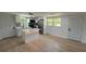 Bright, open kitchen features stainless steel appliances, quartz countertops, and a stylish island at 1011 W 16Th St, Sanford, FL 32771