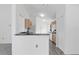 Open kitchen featuring a breakfast bar, modern appliances, and lots of cabinet space at 10984 Pinewood Cove Ln, Orlando, FL 32817
