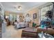 Comfortable main bedroom featuring large windows and ample space for relaxation and rest at 1107 Carringdale Dr, Orlando, FL 32828