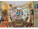 Charming breakfast nook with a round table and inviting decor, perfect for casual meals at 1107 Carringdale Dr, Orlando, FL 32828