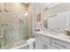 Modern bathroom with a beautifully tiled glass shower and a stylish vanity at 12530 Climbing Vine Ct, Windermere, FL 34786