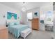 Charming bedroom features a comfortable bed, coordinated decor, and natural light at 12530 Climbing Vine Ct, Windermere, FL 34786