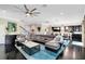 Expansive living room featuring a plush sectional, contemporary decor, and an open layout at 12530 Climbing Vine Ct, Windermere, FL 34786