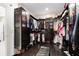 Large walk-in closet offers custom shelving and ample storage space at 12530 Climbing Vine Ct, Windermere, FL 34786