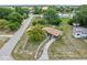 Aerial view of a single-Gathering home featuring a large yard and mature trees at 1330 Lakeview Rd, Lake Wales, FL 33853