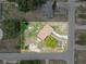 Bird's eye view of the property, set on a corner lot with a fenced in yard at 1330 Lakeview Rd, Lake Wales, FL 33853